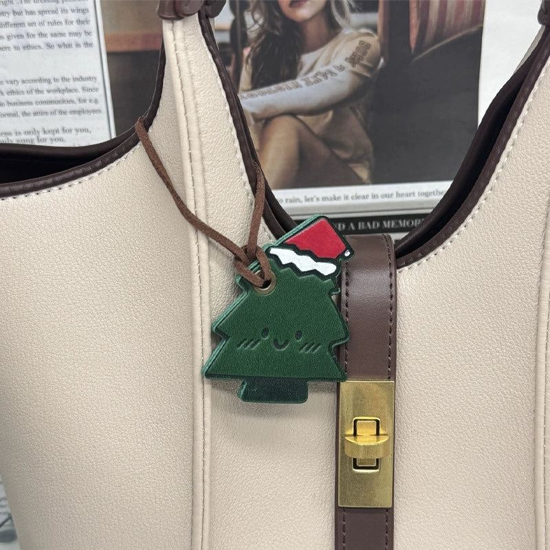 Handmade Christmas tree leather charm – holiday bag accessory