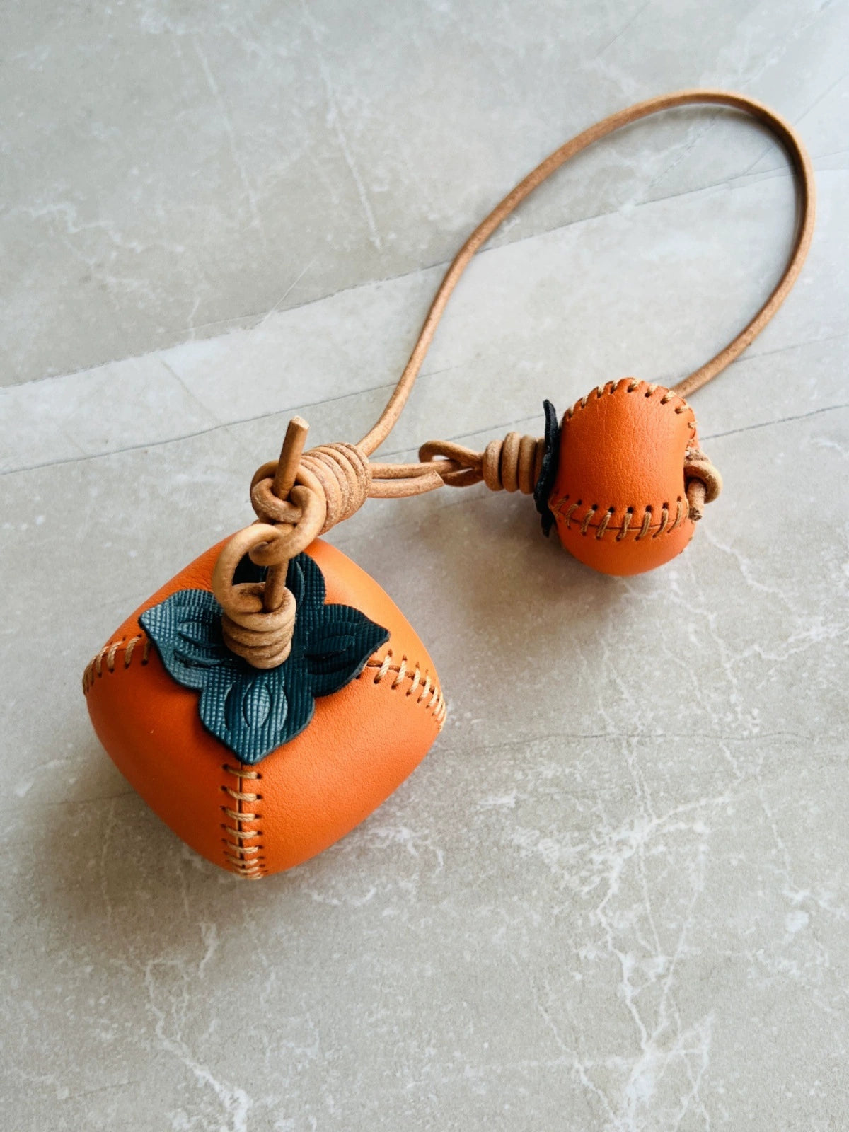 Leather bag charm persimmon – handmade holiday accessory